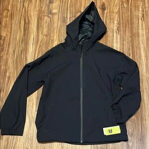 All in motion women’s medium jacket Black waterproof Hooded zip pockets NWT